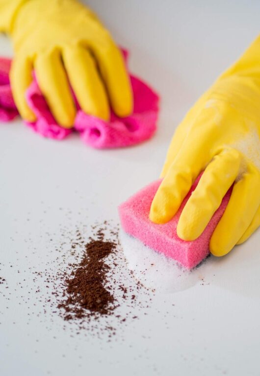 close-up-hands-with-rubber-gloves-disinfecting (1)