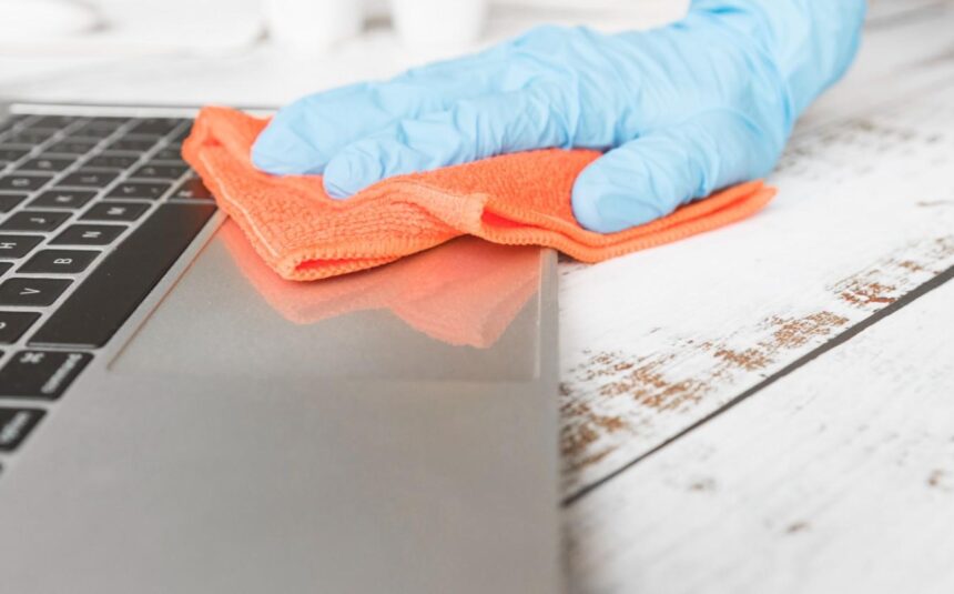 hand-cleaning-laptop hand-cleaning-laptop