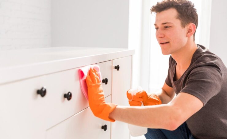 man-cleaning-his-home