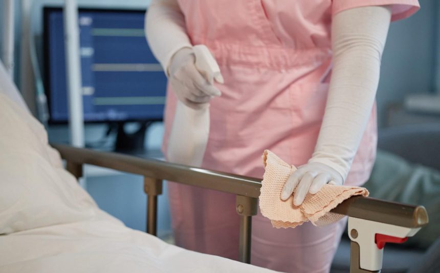 cleaning-hospital-bed-with-sanitizing-cloth-in-hea-2026-01-09-11-38-44-utc (1)