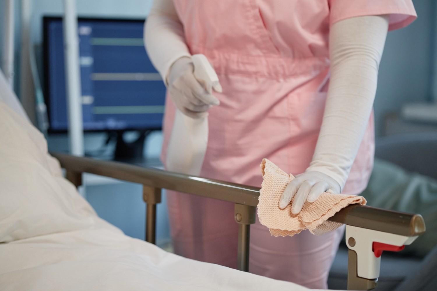 cleaning-hospital-bed-with-sanitizing-cloth-in-hea-2026-01-09-11-38-44-utc (1)