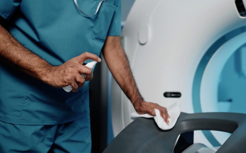 radiographer-cleaning-ct-scanner-bed-2026-01-07-23-58-07-utc (1)