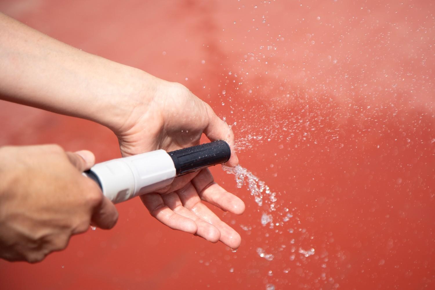 meek-with-water-hose-wetting-terrace-floor-2026-03-17-03-34-22-utc (1)